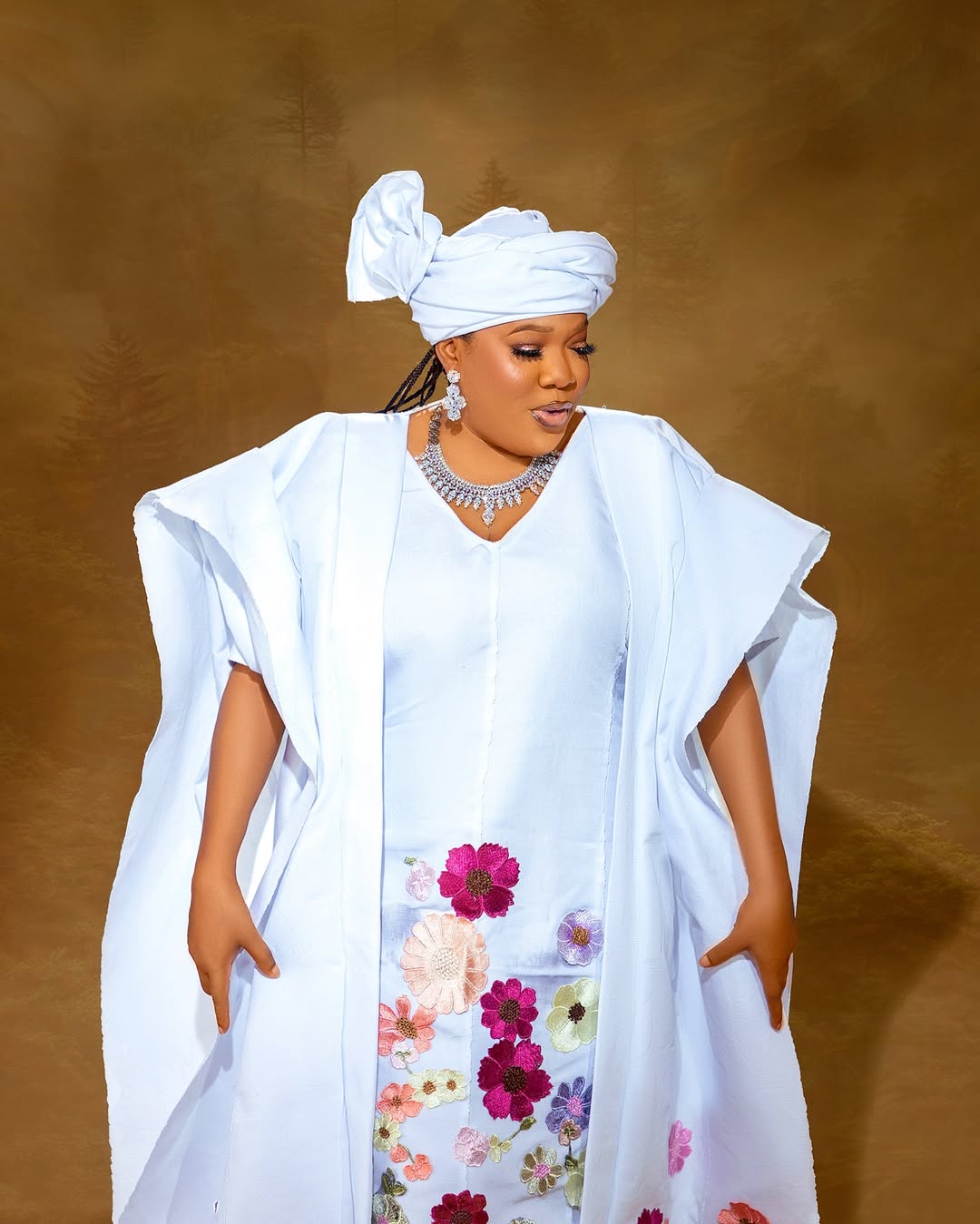 Toyin Abraham Is the Picture of Elegance in This White Agbada-Inspired Look