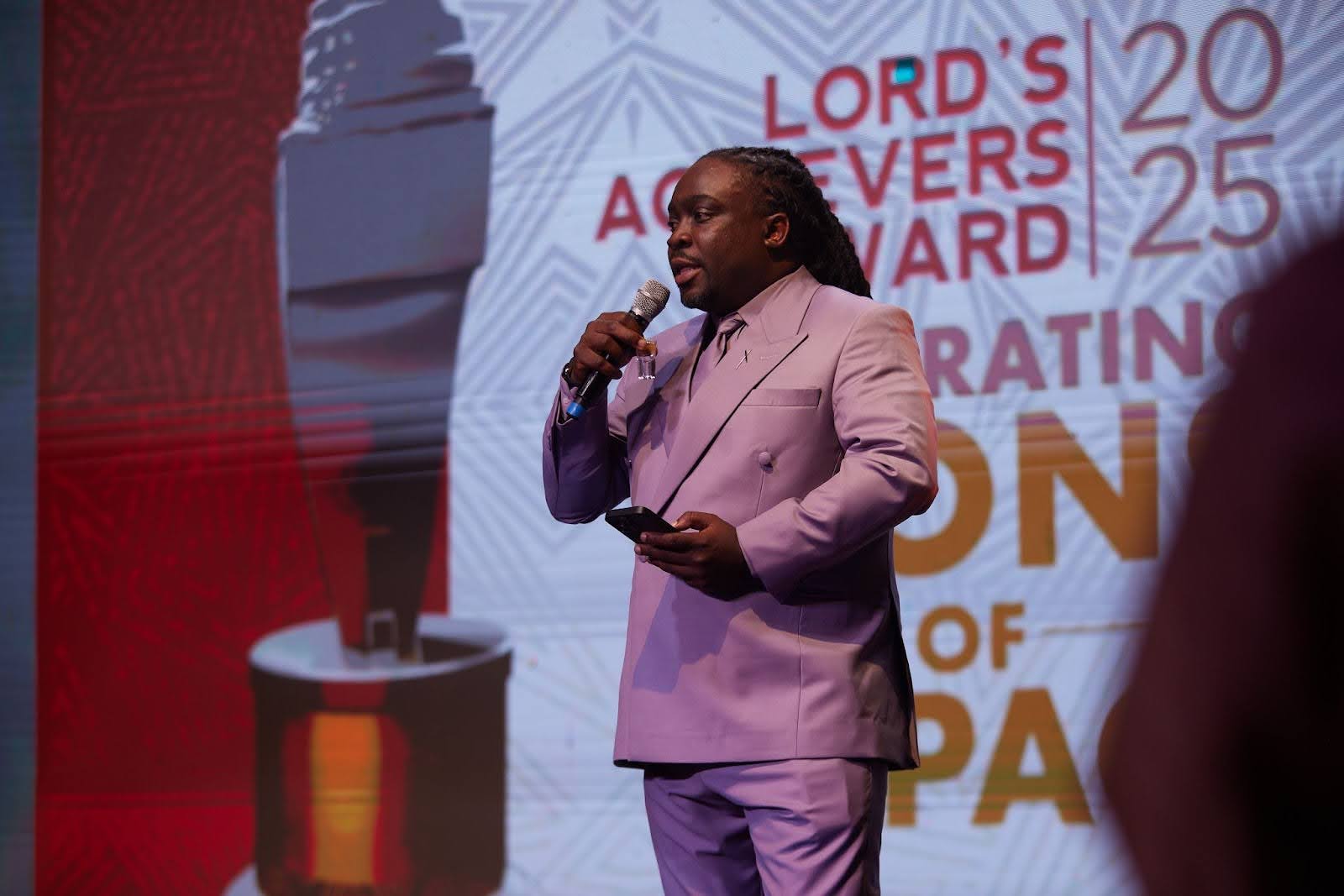 Olusegun Akinyemiju giving a toast