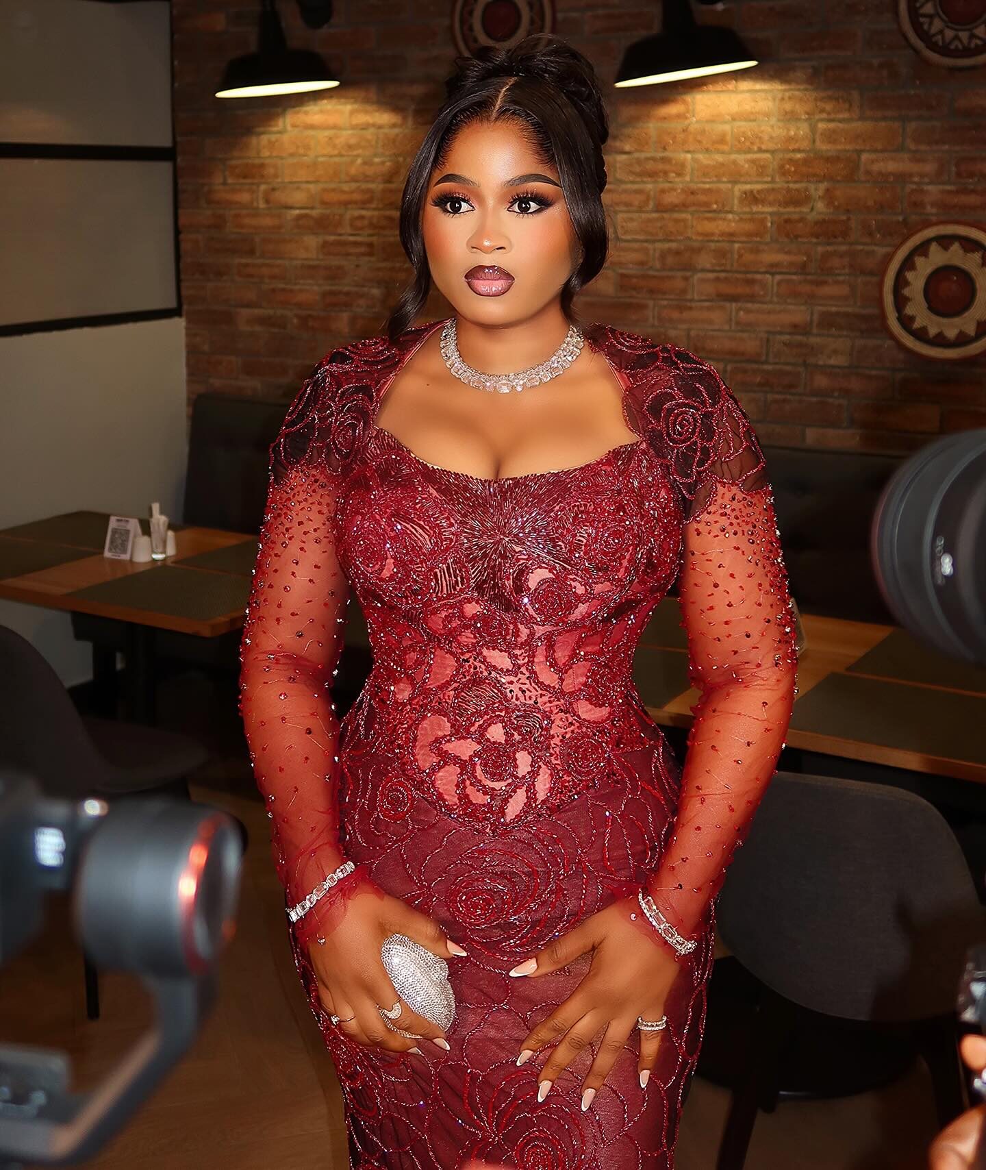 Imisi Served Glamour at the BBNaija Winner’s Party in Burgundy Lace & Swarovski Crystals