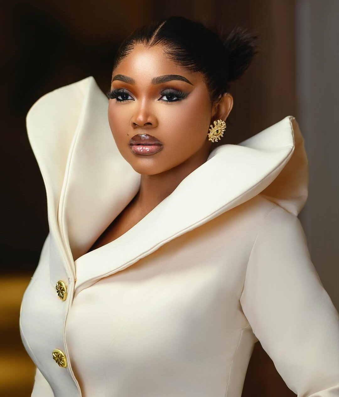 Mercy Aigbe Is Serving Monday Office Glam in This Ivory Coat Dress