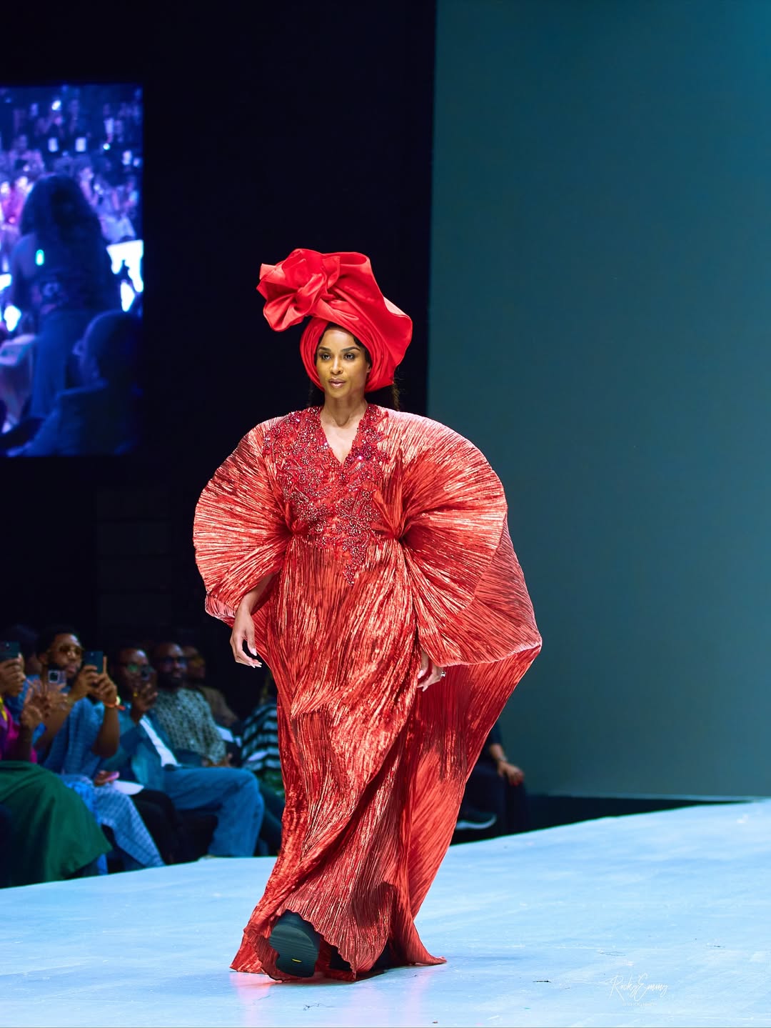 Ciara Walks for Fruché in a Bold Red Gown at Lagos Fashion Week