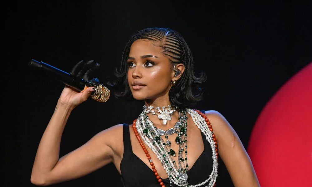 Tyla's Iconic Performance: Dazzles with 'CHANEL' Inside Giant Stiletto on The Tonight Show!