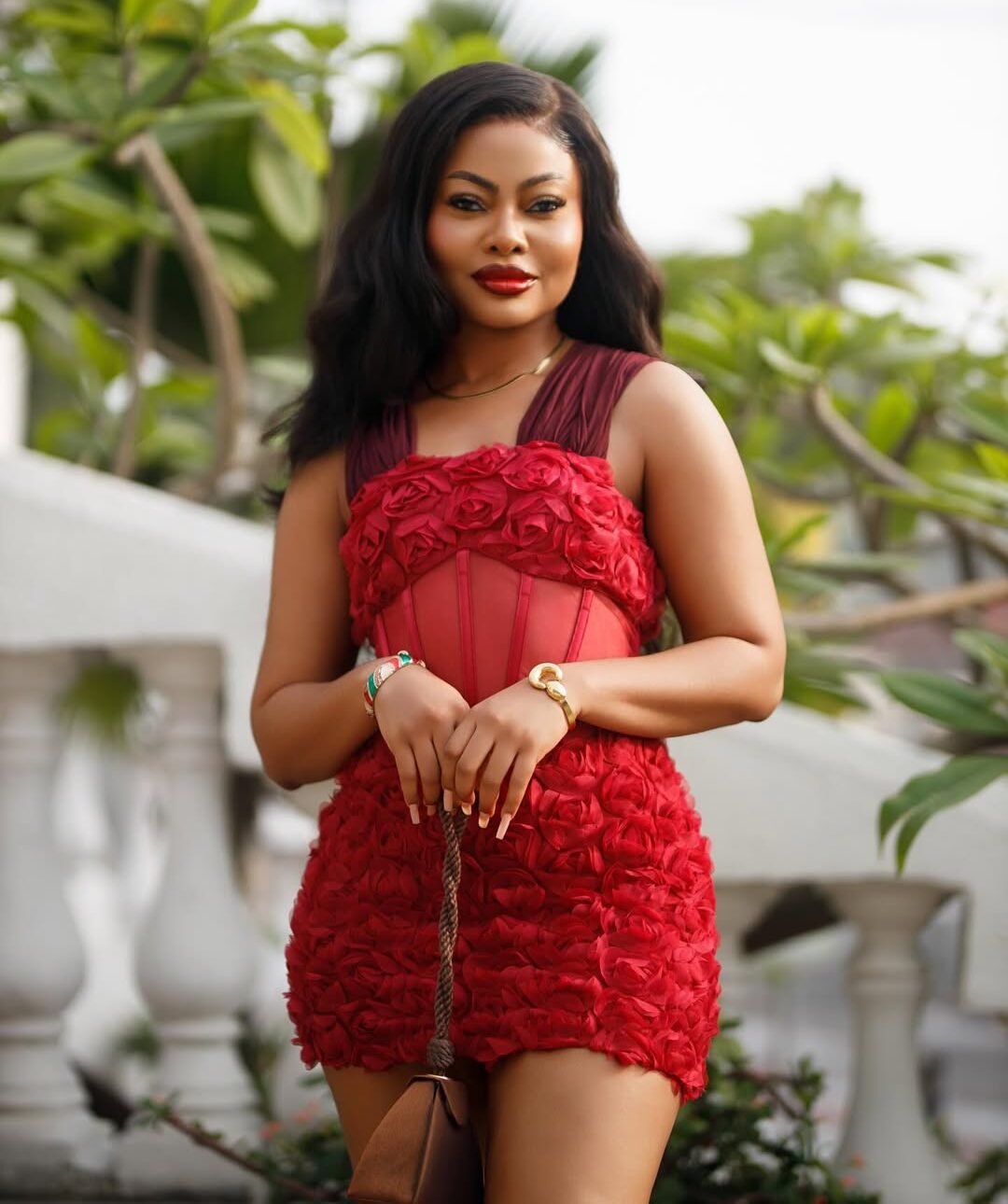 Teniola Aladese in This Red Mini Dress Is Everything We Needed to See Today
