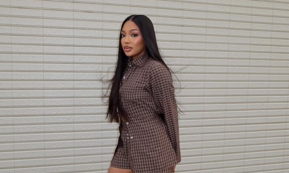 Mide Iwasokun is Serving Major Style Inspo in This Plaid Co-ord & Frilly Socks Combo!