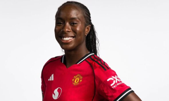 Official studio portrait of Simi Awujo, Manchester United Women’s midfielder. She is smiling, with her hair in neat braids, wearing the 2025/26 red home kit featuring the Snapdragon sponsor logo.