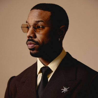 A portrait of Michael B. Jordan, who won the 2026 Best Actor Oscar for his dual role as twins Smoke and Stack in the film Sinners.