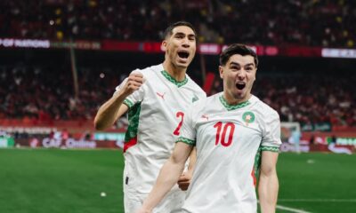 Morocco’s Brahim Díaz and Achraf Hakimi celebrating a goal during the 2025 Africa Cup of Nations quarter-final against Cameroon in Rabat.