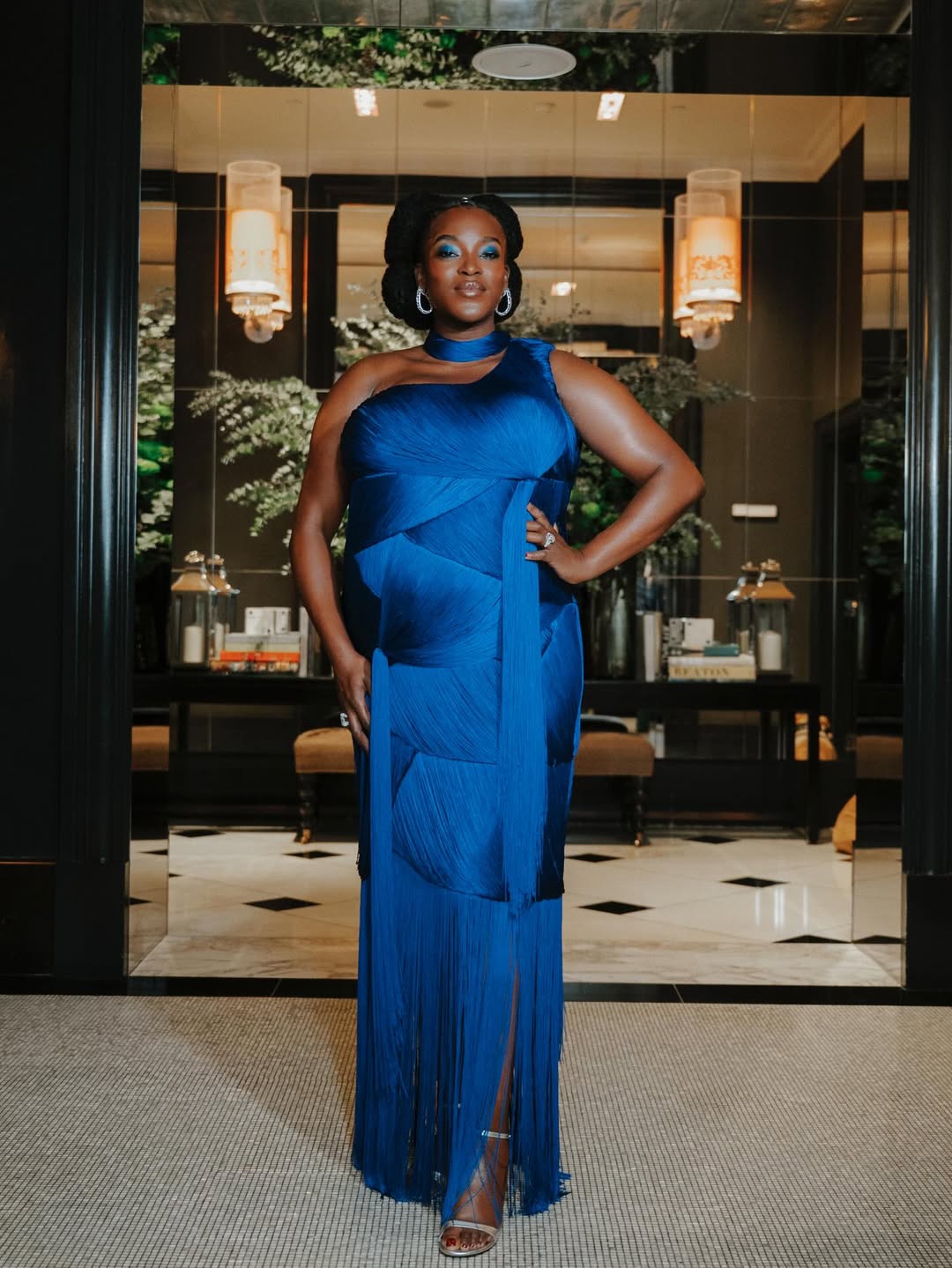Wunmi Mosaku at the 2026 BAFTAs in a royal blue fringed Ahluwalia gown, where she won Supporting Actress for her role in Sinners.