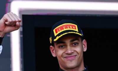Close-up of a smiling Ugo Ugochukwu in his Campos Racing gear pumping his fist after securing his first FIA Formula 3 win in Melbourne.