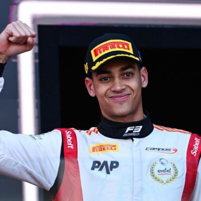 Close-up of a smiling Ugo Ugochukwu in his Campos Racing gear pumping his fist after securing his first FIA Formula 3 win in Melbourne.