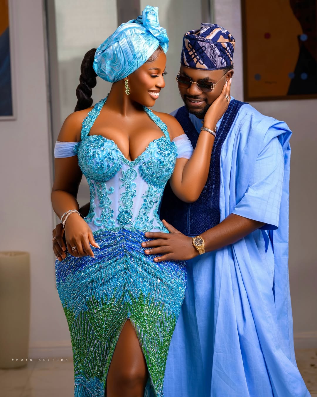 Hilda Baci and Damilola Akinwunmi posing together in coordinated blue traditional outfits at the Simi Sanya and Femi Dapson's traditional wedding.