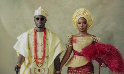 Simi Sanya in a beaded burgundy and champagne gown by Veekee James and Femi Dapson in a champagne agbada by Tochini Bespoke.