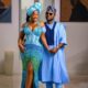 Hilda Baci and Damilola Akinwunmi posing together in coordinated blue traditional outfits at the Simi Sanya and Femi Dapson's traditional wedding.