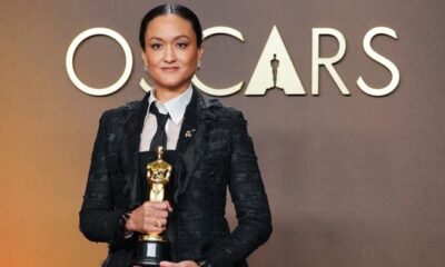 Cinematographer Autumn Durald Arkapaw holding her Academy Award for Best Cinematography for the film Sinners, wearing a black structured coat and tie at the 98th Oscars. Photo Credit: Autumn Durald Arkapaw/Instagram