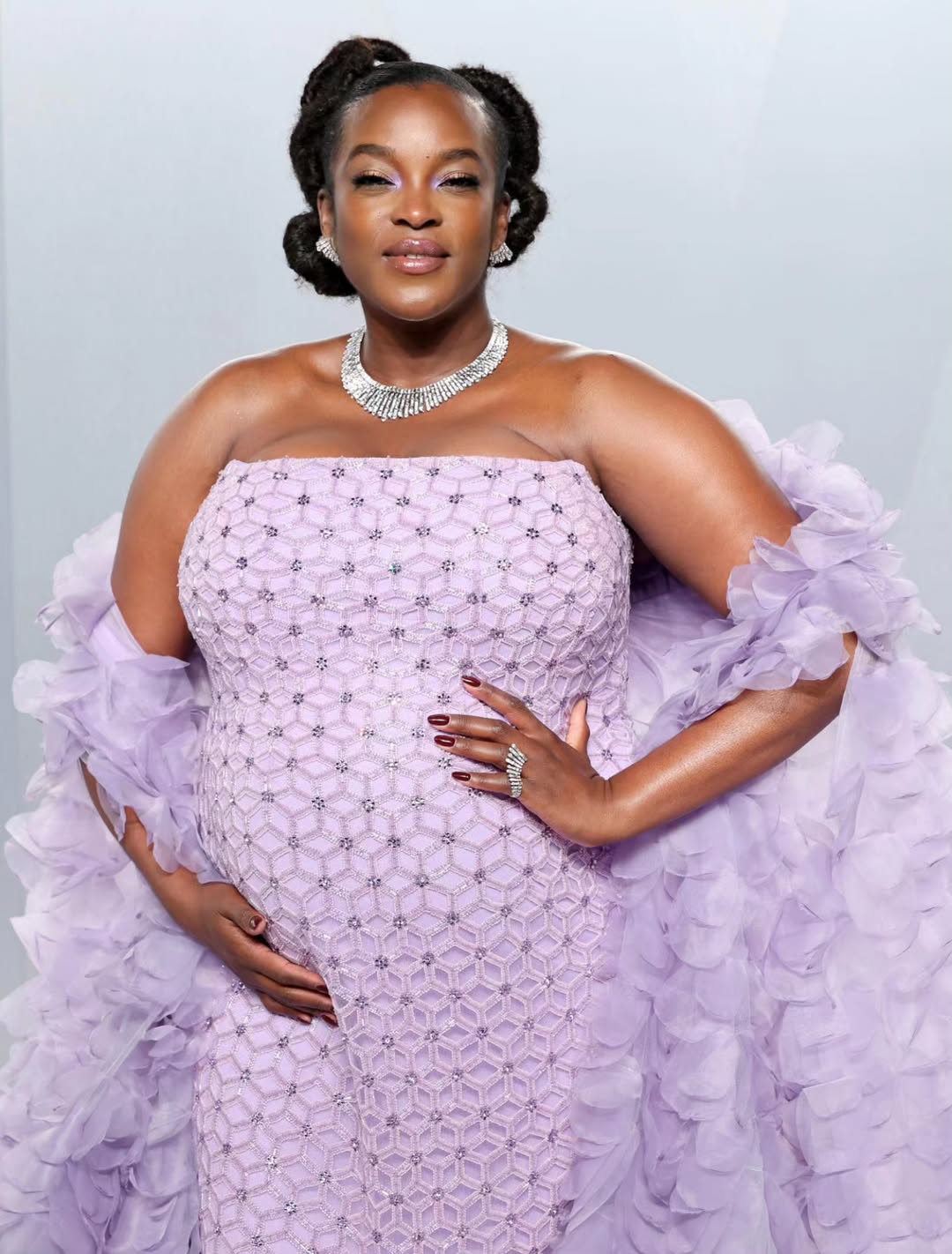 Wunmi Mosaku arriving at the 2026 Vanity Fair Oscar Party in a custom purple Georges Chakra gown and Marli jewellery, following her Best Supporting Actress nomination for Sinners.