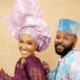 Falz in a turquoise floral Agbada and a model in a purple lace buba and lilac Gele posing together.