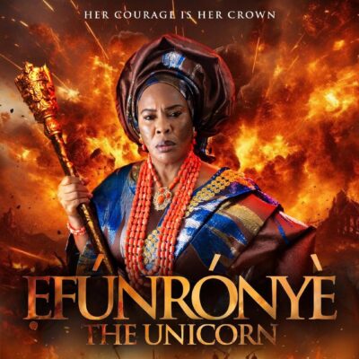Official movie poster for Efunroye: The Unicorn featuring Faithia Williams in traditional 19th-century Yoruba royal attire holding a golden staff against a backdrop of fire and battle.