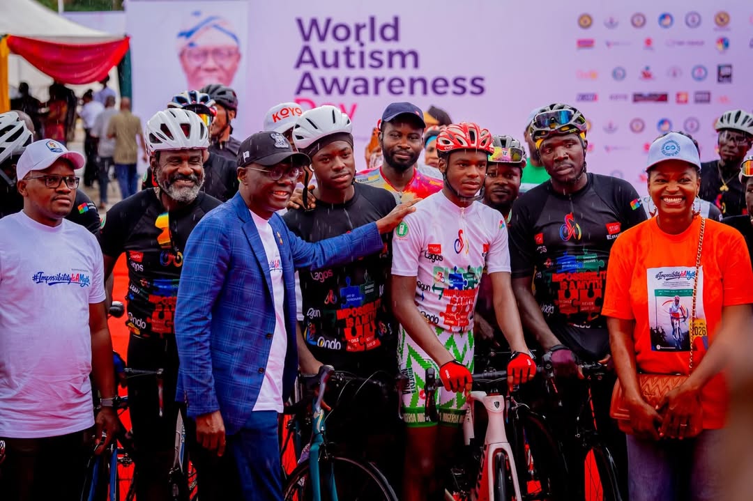 Governor Babajide Sanwo-Olu welcoming Guinness World Record cyclist Kanyeyachukwu Tagbo-Okeke to Lagos House Marina.