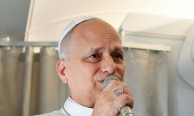 Pope Leo XIV speaking to a group of journalists on board the papal flight to Algiers at the start of his 10-day African journey.