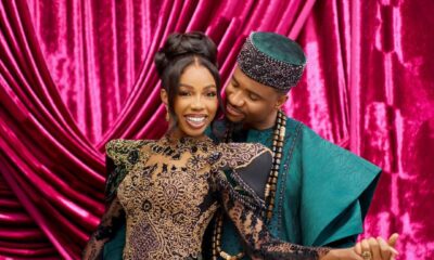 A close-up of Nollywood actor Jide Kene Achufusi in an emerald green Agbada and his bride Ifeoma in a black and gold sculptural Isi-Agu gown during their Igba Nkwu ceremony.