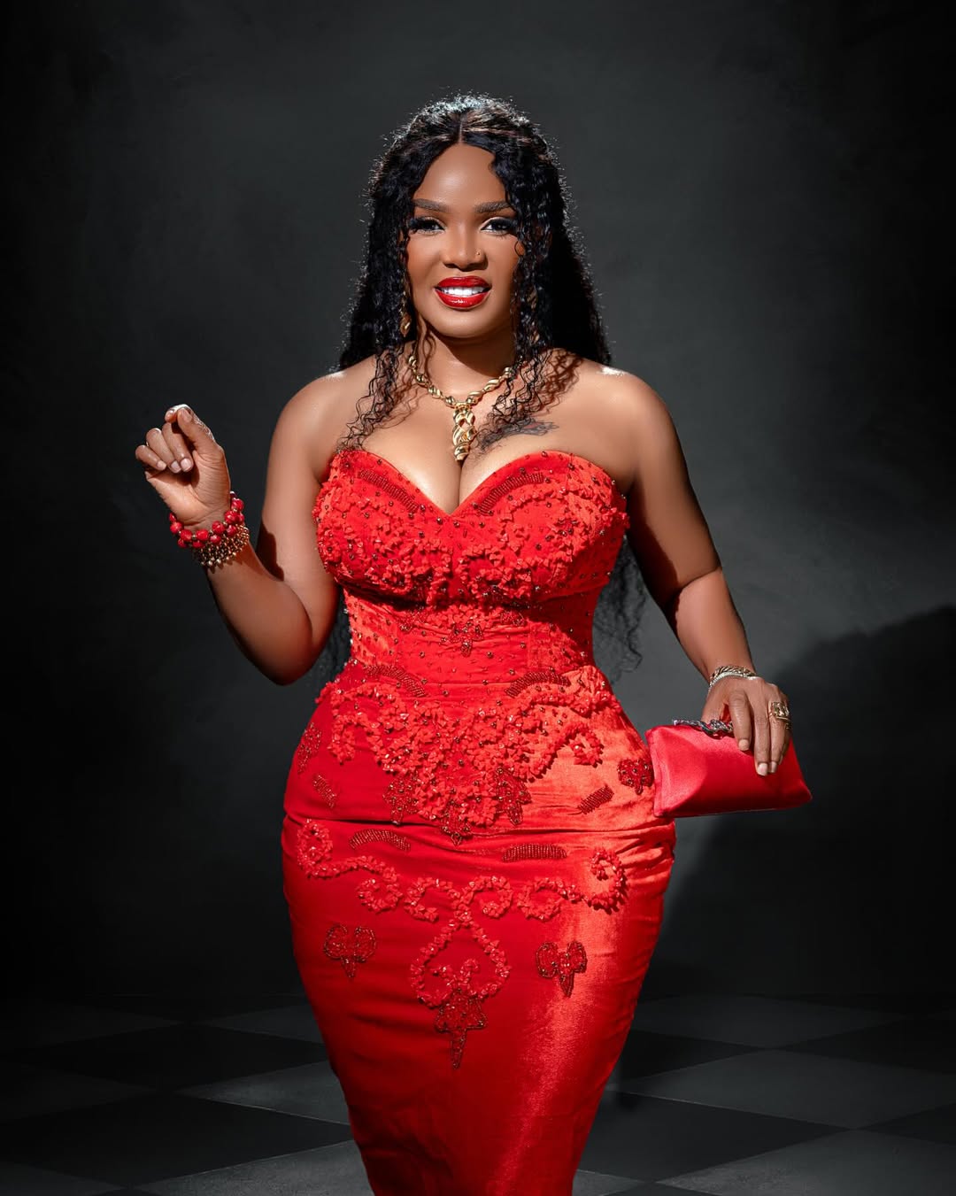 Iyabo Ojo Makes a Bold Case for Scarlet in This Sculpted Couture Look