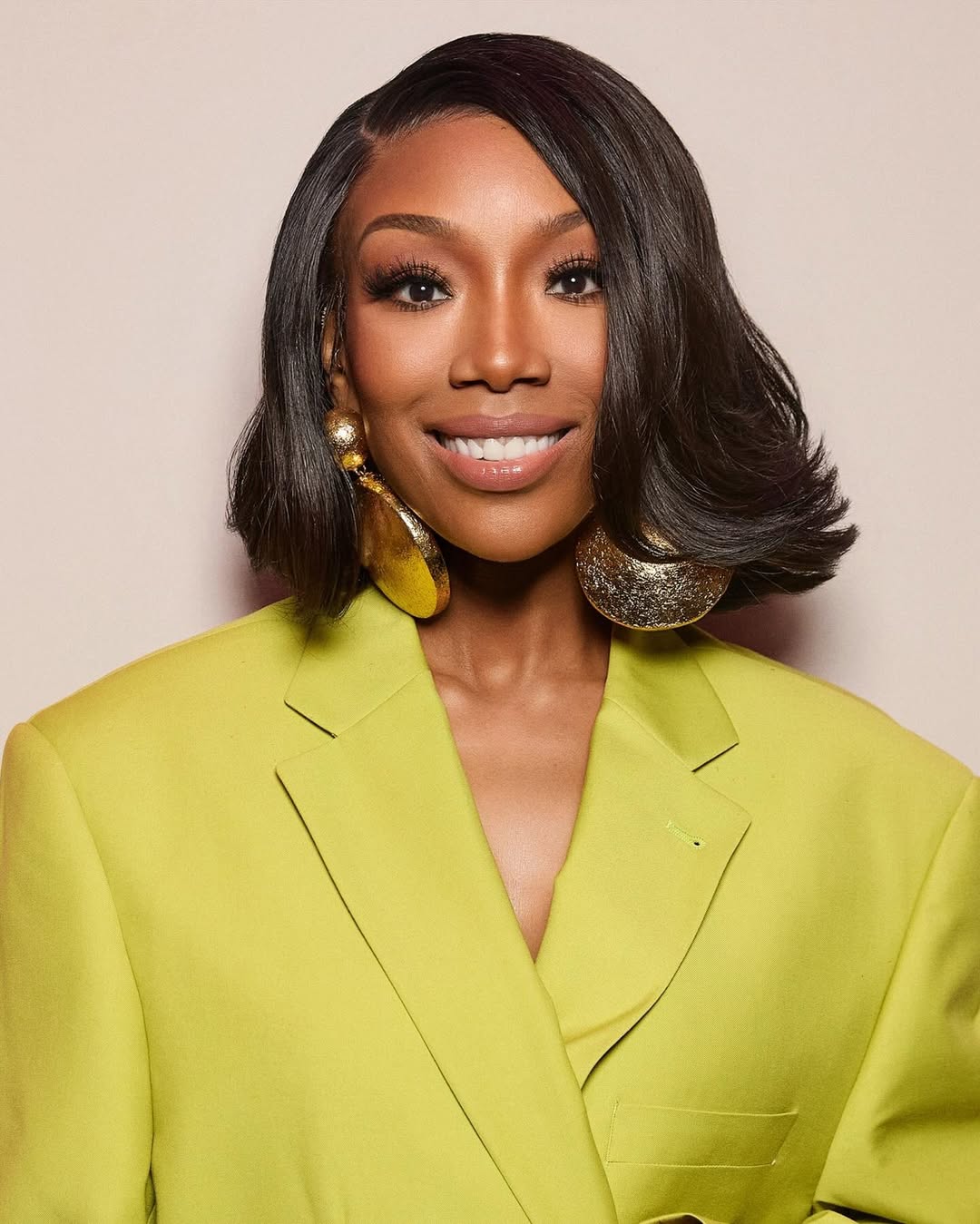 Brandy Walked Into The Jennifer Hudson Show Spirit Tunnel in Lime Green and We Loved It