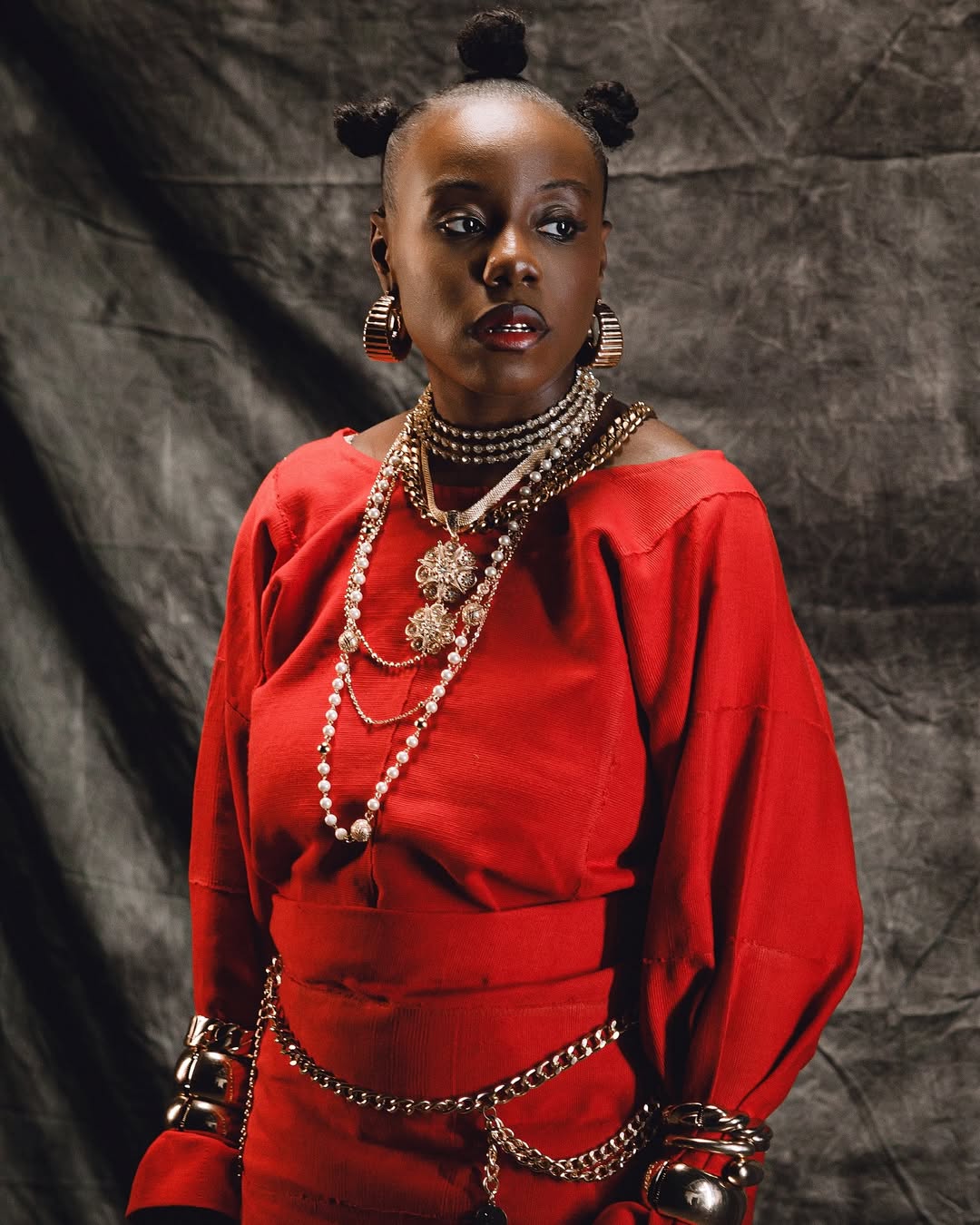 Teni Stuns in Head-to-Toe Red in Her New “Zion” Video With Olamide