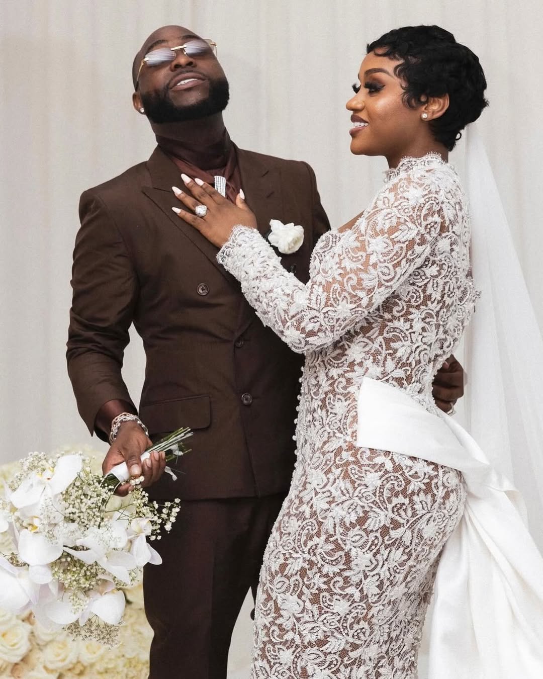 Davido and Chioma Adeleke posing together on their wedding day in August 2025