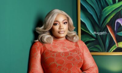 Portrait of the character Maya, played by Tajé Prest, in a vibrant orange and blue ensemble for the vertical drama series Thick & Uninterrupted.