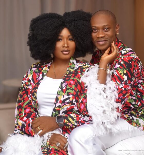 Lateef Adedimeji and Adebimpe wearing matching vibrant patterned robes with white feather trim.