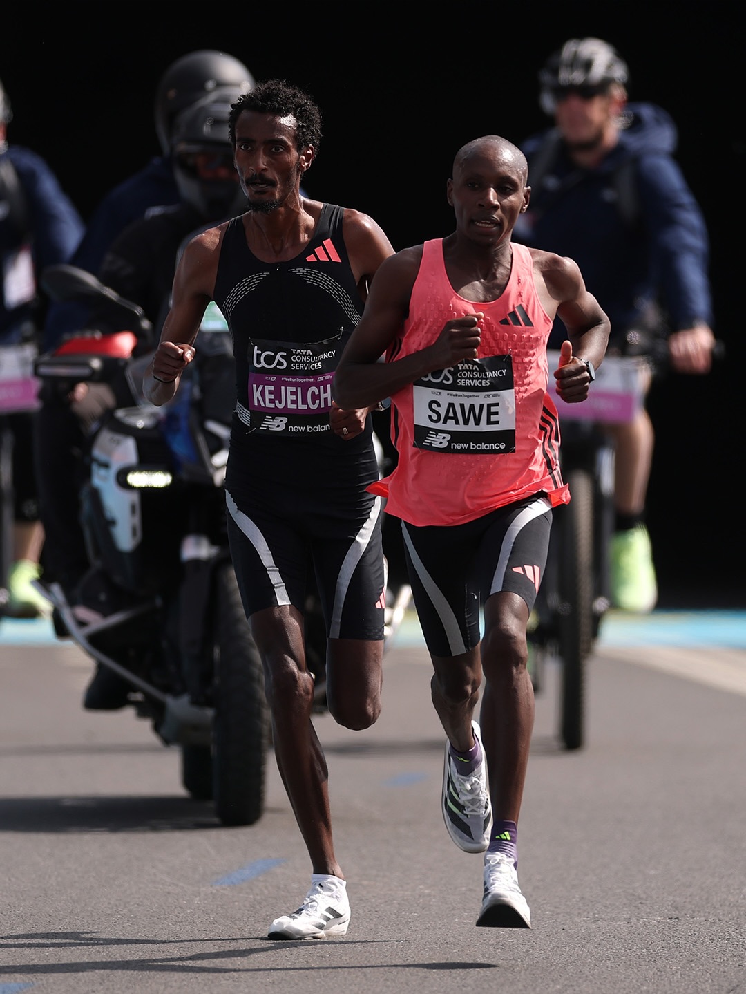 Sabastian Sawe and Yomif Kejelcha competing during the 2026 London Marathon where Sawe broke the sub-two-hour world record.