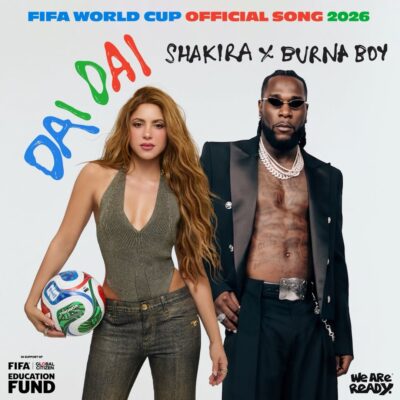 Official single cover for "Dai Dai" featuring Shakira holding a football and Burna Boy in an open black suit jacket and diamond chains.