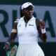 Ninth seed Victoria Mboko clenching her fist in celebration on the clay court after winning a point during her first-round match at the 2026 French Open.