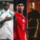 Senegal's Sadio Mané with his hand over his heart, Morocco's Achraf Hakimi in his red national team jersey, and Chelsea's Nicolas Jackson in a black t-shirt against a red background.