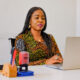 Nkechi Okenwa, CEO of Energy Excell Systems and Solutions, working on her laptop in her office at CITEC Estate by Jabi-Airport Road bypass, FCT Abuja, Nigeria on April, 1, 2026. Photo: Jerry Ogbe, bird story agency