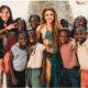 Colombian singer Shakira posing for a group photo with Uganda’s Ghetto Kids on the set of the Dai Dai official 2026 FIFA World Cup anthem music video.