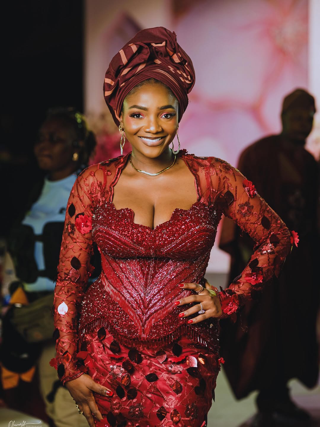 See How Simi Slayed in Burgundy Corset Glam at Her Mother’s 70th Birthday