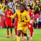 Nineteen-year-old Caleb Yirenkyi smiling and shouting in celebration with open arms on the pitch at Toronto Stadium after scoring against Panama.