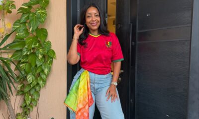Actress Joselyn Dumas styles a retro red Ghana national team football jersey with wide-leg denim jeans for the 2026 FIFA World Cup fixture against Panama.