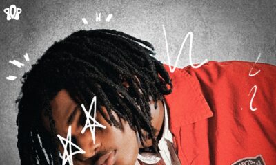Official single cover art for Uche Jumbo by Taves, featuring a close-up profile of the artist in a red jacket with white hand-drawn star illustrations over his eyes.