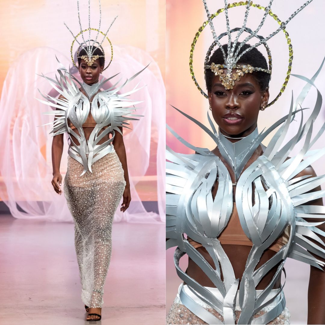 Kimberly Jael Aremo Acio models a silver metallic halo headpiece, sculpted corset, and sheer embellished skirt during the Miss Universe Uganda 2026 Super Model Challenge.