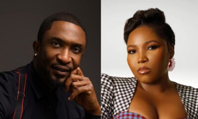 Portrait of Darey Art Alade in a black shirt with braces alongside Sasha P in a monochrome patterned outfit, celebrating their Recording Academy invitations.