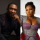 Portrait of Darey Art Alade in a black shirt with braces alongside Sasha P in a monochrome patterned outfit, celebrating their Recording Academy invitations.