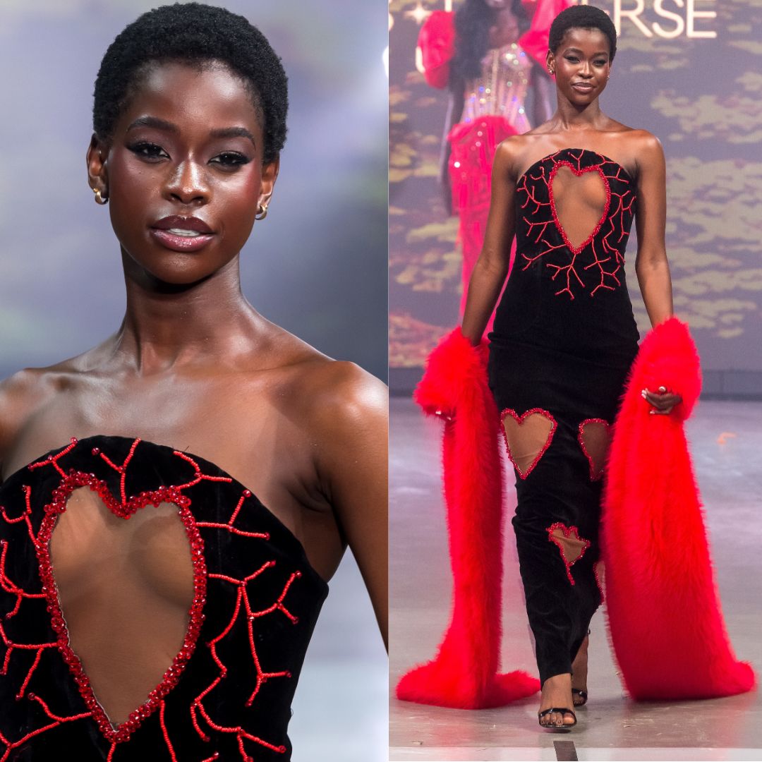 Kimberly Jael Aremo Acio wearing a strapless black velvet evening gown featuring sheer heart-shaped cut-outs with red beadwork and a red faux-fur wrap during the Miss Universe Uganda 2026 Top 15 unveiling.