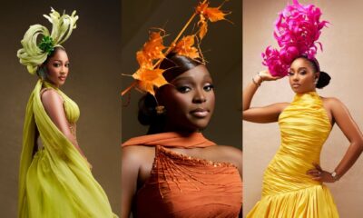 Hawa Magaji in a chartreuse chiffon gown, Tomike Adeoye in a burnt orange dress with Jacquemus bag, and Kiky Festus in a yellow dress with pink feather fascinator at the #ElianasFruitGarden reception.