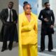 Adekunle Gold in a formal black overcoat, Rita Dominic in a custom yellow Medlin Couture suit, and Akin Faminu in an asymmetric black OJ Clothing suit.