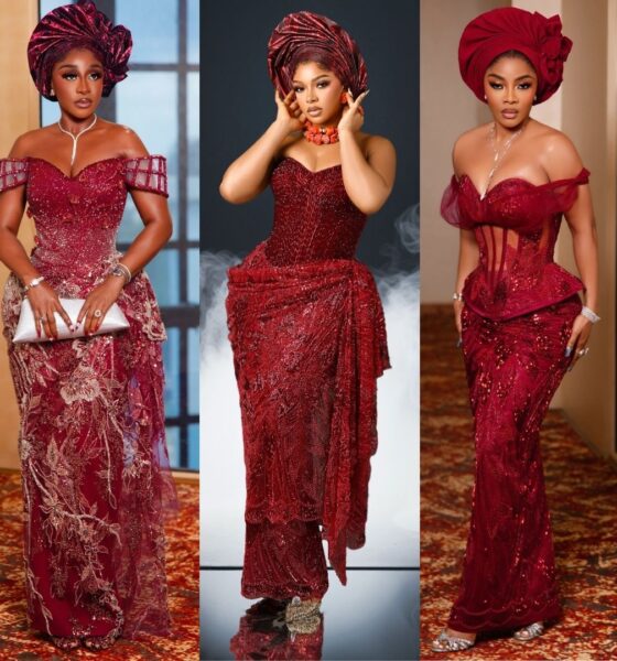 Ini Edo in a gold-embroidered burgundy lace gown alongside Liquorose in a wine-red beaded corset gown with coral beads and Toke Makinwa in a sequined peplum corset dress at Soso Soberekon's wedding.