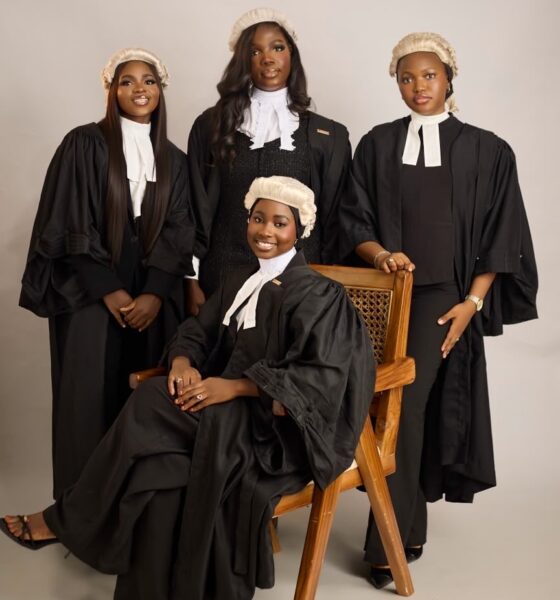 Four female Nigerian lawyers wearing traditional white legal wigs, collared bands, and black barrister gowns during the Call to the Bar ceremony.