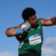Nigerian shot putter Chukwuebuka Enekwechi executing a 21.07-metre throw to win gold in the men's shot put at Glasgow 2026.