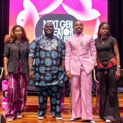Collette Otsu, Abisola Alawode, Enioluwa Adeoluwa in a pink suit, and Korty EO standing on stage at the BellaNaija Next Gen Creator House workshop in Lagos.